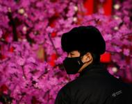 2017年1月3日，北京，一名戴著口罩的安保人員。攝影：Thomas Peter