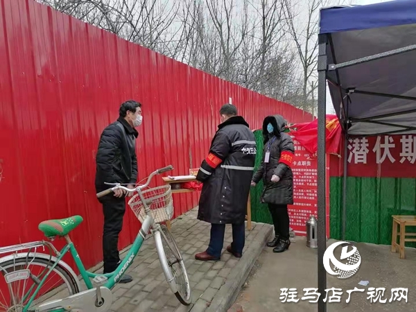 2上蔡縣重陽街道：黨員“夫妻檔”“防疫”好戰士.jpg