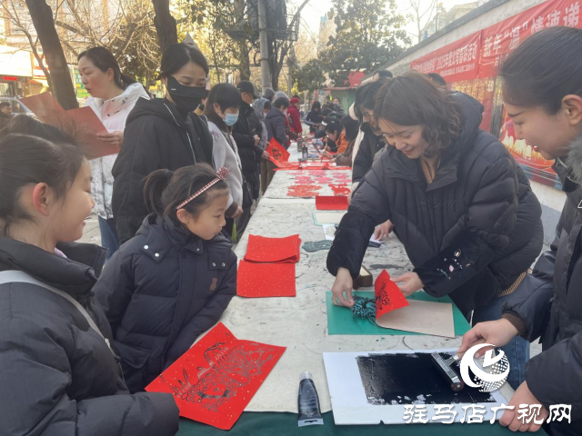 驛城區西園街道辦事處開展“書香傳文明 迎春納新福”義寫春聯活動